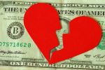 Broken heart on dollar banknote - Concept of how is debt divided in divorce.